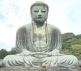 An ancient statue of the buddha with a serene facial expression