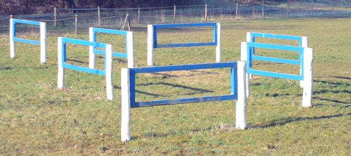 A course of horse hurdles in a field
