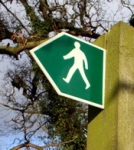 Sign with a silhouette of a person walking