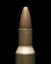 A picture of a bullet against a black background