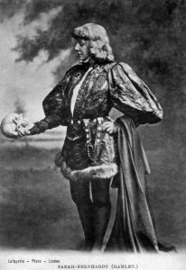 An old photograph shows actress Sarah Bernhardt, in the role of Hamlet, speaking to a skull that she holds in her hand